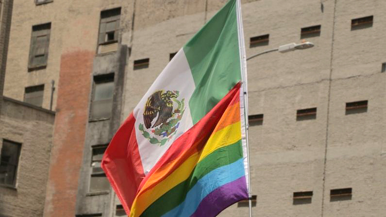 Mexican and Pride flags