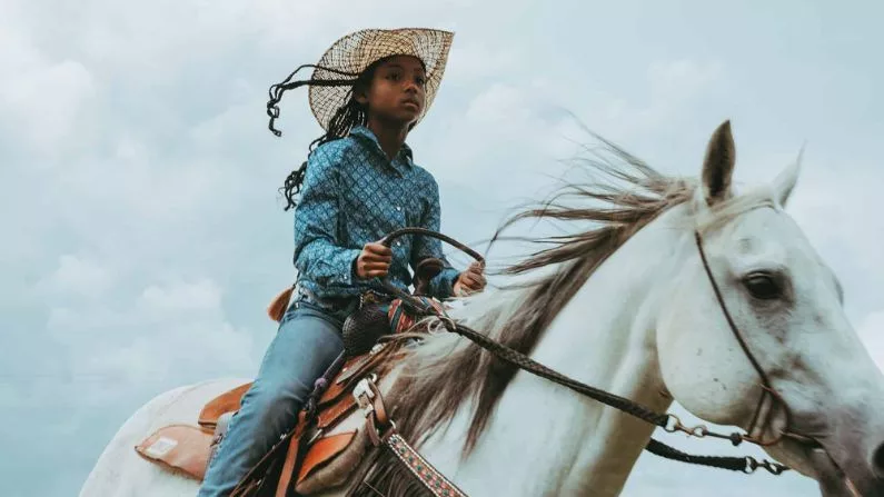 ‘8 Seconds’ photo exhibit expands the narrative around the American cowboy