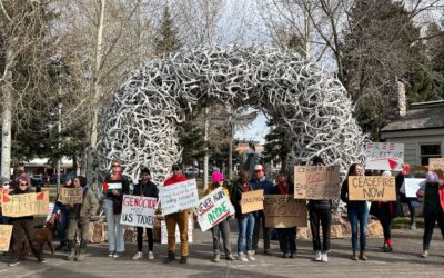 Groups commemorate lives lost during a year of war