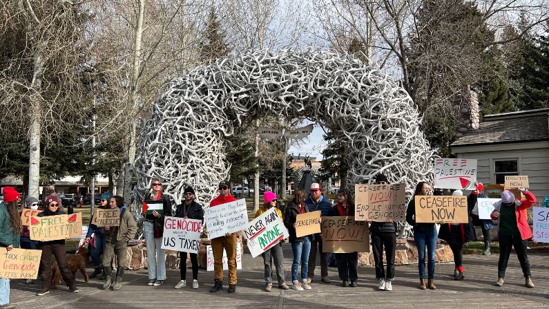 Groups commemorate lives lost during a year of war