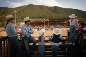 Parents Lisa and Ryan drove up from Etna so Morgan,7, Walker, 7, and Reagan, 8, Lakovitch could participate in mutton bustin’ and peewee barrel races. (Emily Cohen / KHOL)