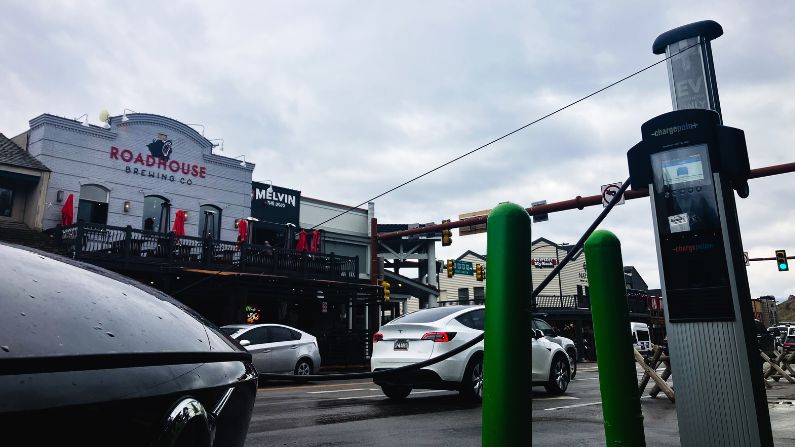 Electric vehicle on town square.