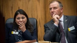 Wyoming State Reps. Rachel Rodriguez-Williams and Chip Neiman listen during a 2023 hearing on their request to defend Wyoming's abortion ban in Teton County District Court.